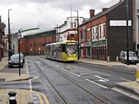 Tram in Union Street between Mumps and Oldham Central 27.01.2014.  Alwyn Smith
